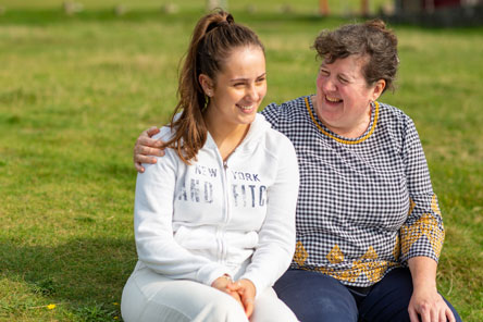 young girl with foster carer