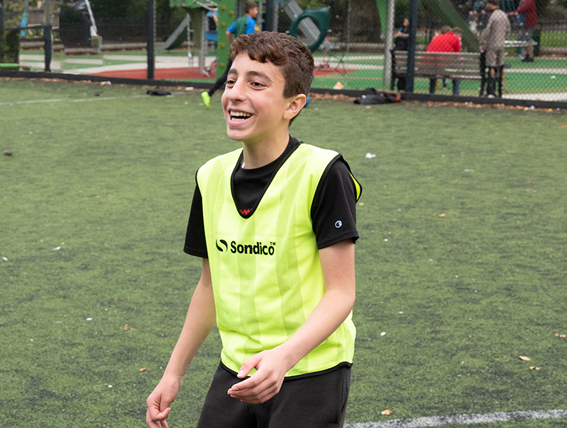 young refugee football player