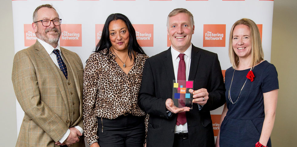 Foster wales team receiving award