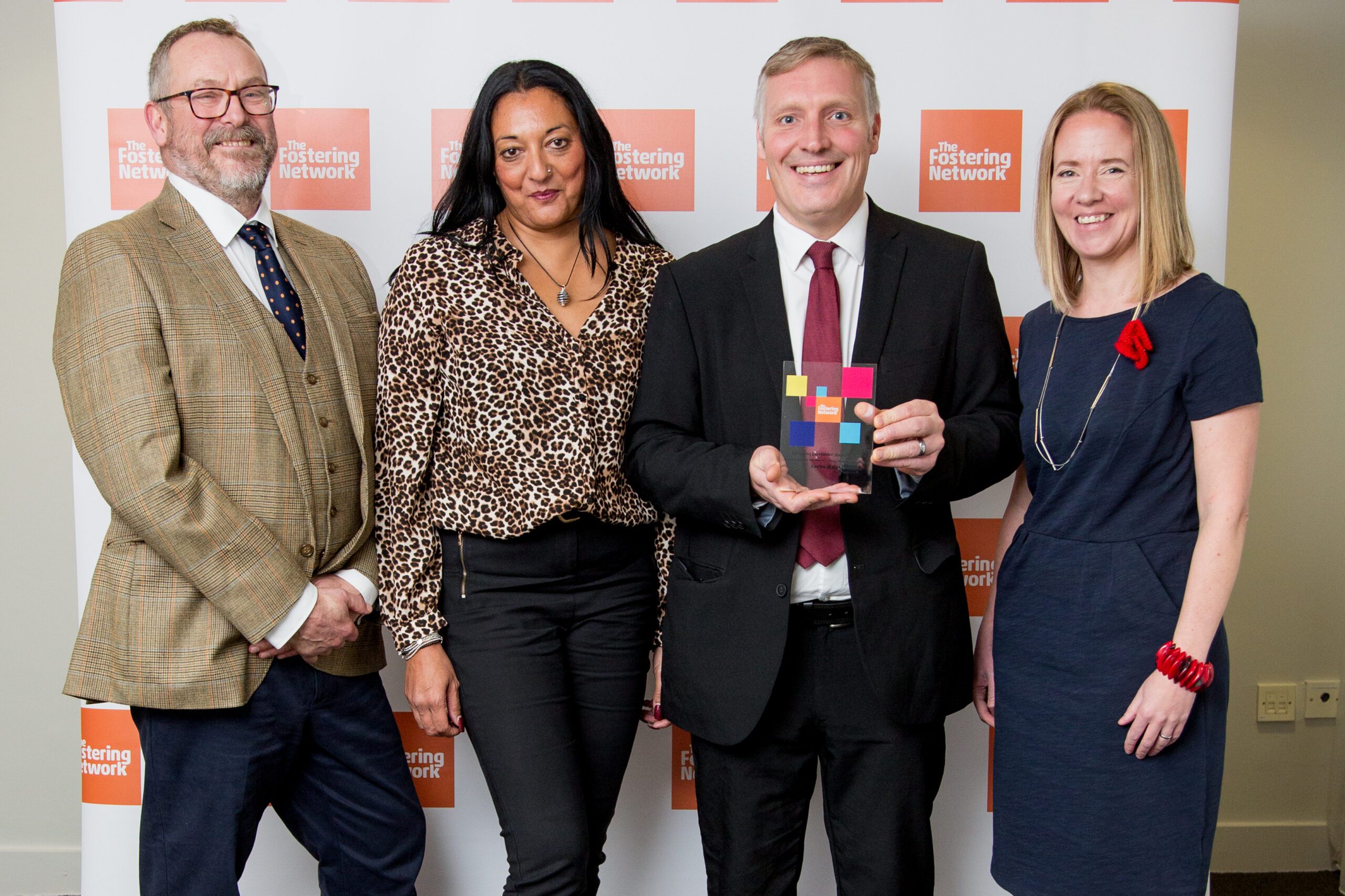 Foster wales team receiving award