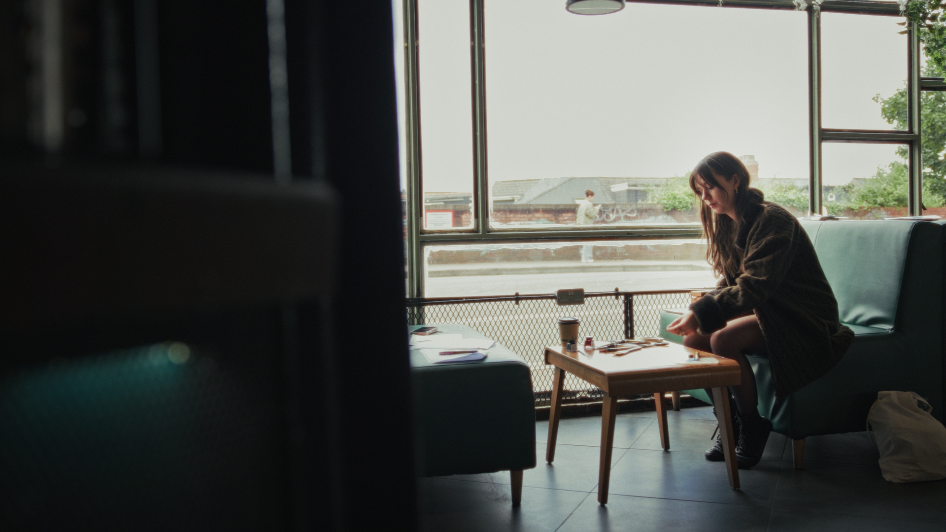 Sophia sat in a cafe