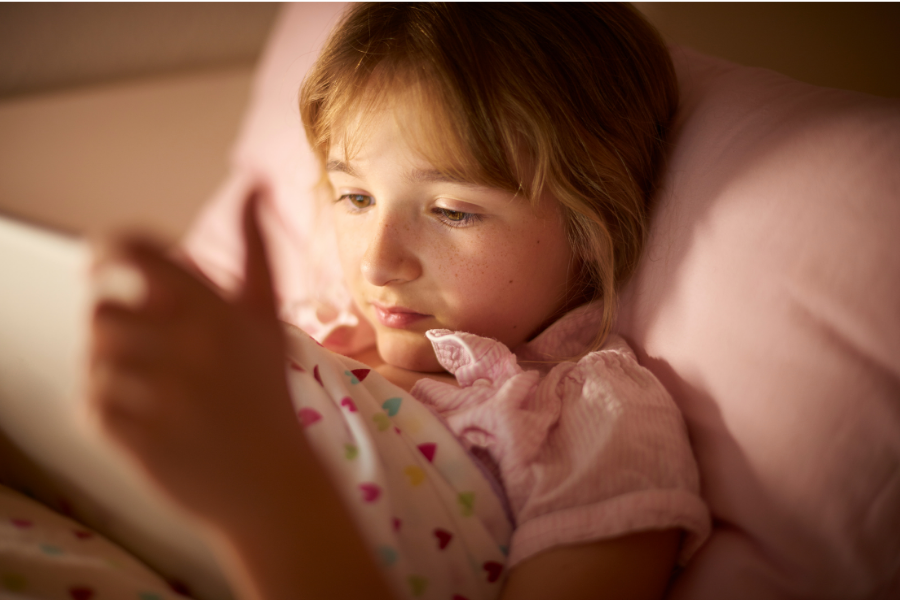 Girl reading a bedtime story